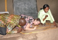 Seen here with Sarah the KIMI Busia Coordinator and Pastor Tom the KIMI Bundibugyo Coordinator.]