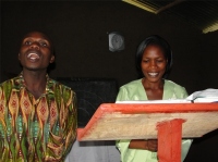 Sarah teaching in Bundibugyo with Pastor Tom acting as her translator during the second KIMI PowerClub Leadership Training hosted by Pastor Laura the KIMI Africa Representative.