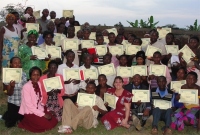 Sarah seen here (front left) at Bundibugyo with Pastor Laura (front center) and the PowerClub leaders trained during this wonderful KIMI Uganda training.