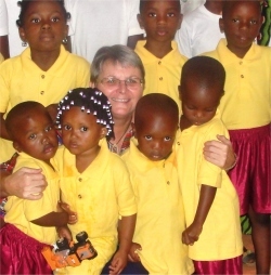Seen here with Jenny Tryhane at church when he received his Hope Children's Choir uniform 