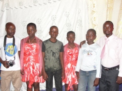 John the videographer, seen below on the left, and Pastor Abraham, (below right) made a CD of Prophetic Humanitarian Gospel Songs to bring awareness of the plight of their brothers and sisters in DR Congo on the street following this countries civil war.