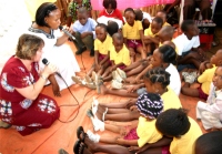 Pastor Laura with her friend 'Goodie Bear' addressed the children