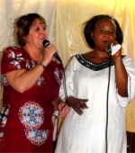 Pastor Martina translating for Pastor Laura as she brought the Word on Sunday at the CEPCI church in Kampala. 