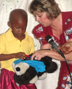 Pastor Martina translating for Pastor Laura as she brought the Word on Sunday at the CEPCI church in Kampala. 