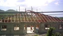 March 2006 update on the church building project in Carriacou, the plastering is almost finished the rafters are up, we trust God for the roof.