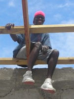 While the ladies painted and cleaned on the ground level the fellows were busy on the roof.