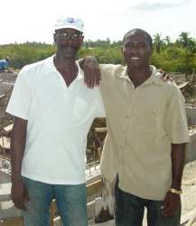 Seen above a brother and friend from Barbados in Carriacou lending a helping hand.