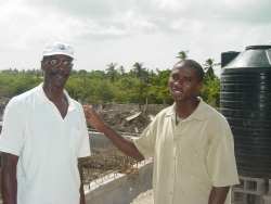 Brother Anderson (left) helping and encouraging Pastor Happy.