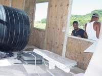 The house owned by Mr. Francis was lifted off the foundation, twisted about and flung where is shown