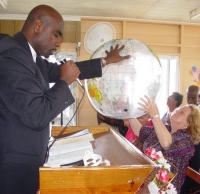 Pastor Sherwood Howell  praying for the world