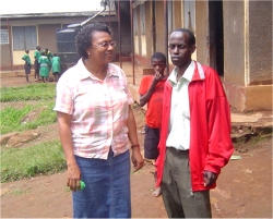 Dr Veronica seen here with the Head Master of Misozi Primary School in Uganda.