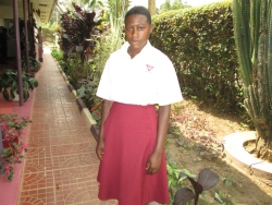 Phionah Nassaazi is a student of Trinity College, sponsored by PCF. 