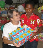 As the shoe boxes were distributed the children were photographed and documented to help establish the Suriname Child Sponsorship Program.