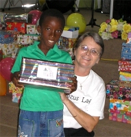 As the shoe boxes were distributed the children were photographed and documented to help establish the Suriname Child Sponsorship Program.