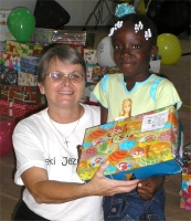 As the shoe boxes were distributed the children were photographed and documented to help establish the Suriname Child Sponsorship Program.