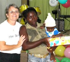 As the shoe boxes were distributed the children were photographed and documented to help establish the Suriname Child Sponsorship Program.