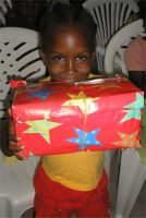 As the shoe boxes were distributed the children were photographed and documented to help establish the Suriname Child Sponsorship Program.