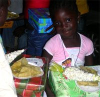 Chicken curry and roti had been prepared and after the party every child left with food and popcorn