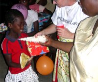 Chicken curry and roti had been prepared and after the party every child left with food and popcorn