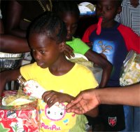 Chicken curry and roti had been prepared and after the party every child left with food and popcorn